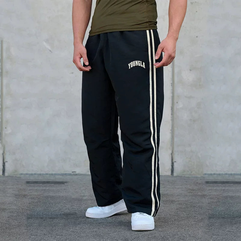 American style trendy sports pants with loose elastic and breathable two bar casual fitness and quick drying European design