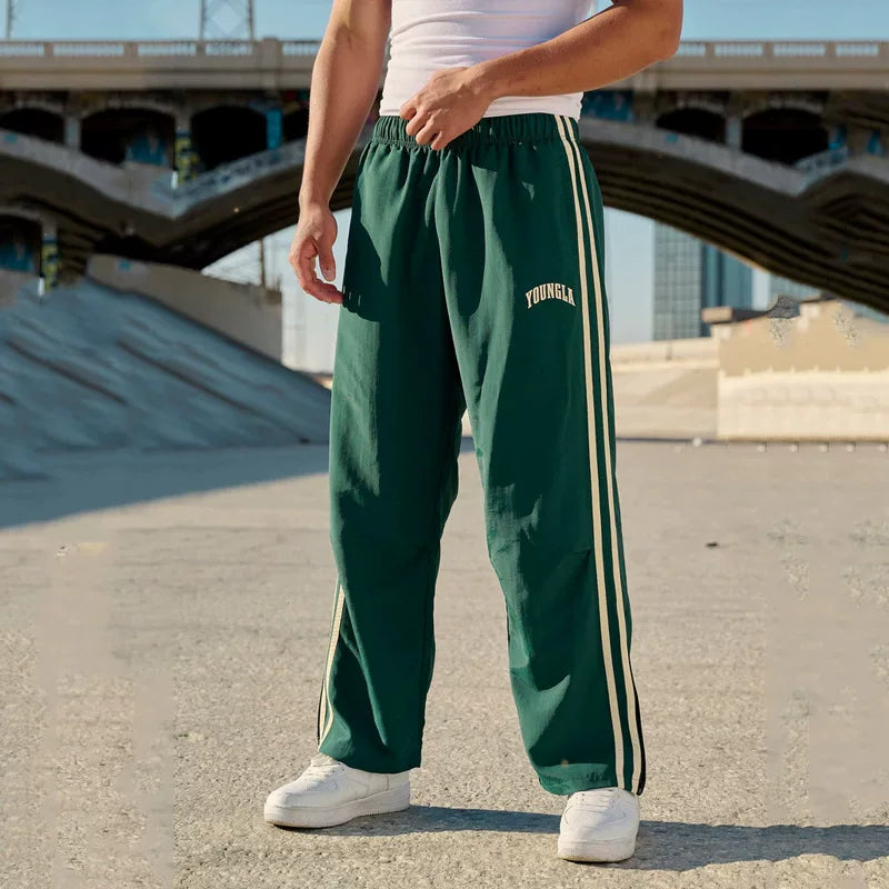 American style trendy sports pants with loose elastic and breathable two bar casual fitness and quick drying European design