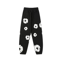 Denim Tears Cotton Wreath Graphic Sweatpants - Black / Relaxed Streetwear Fit